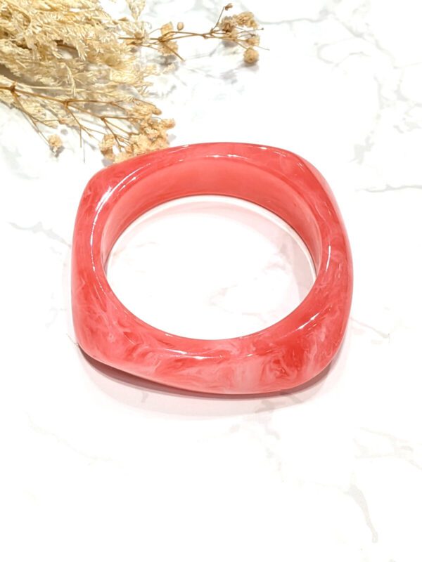 Pulsera rigida de resina Saturno